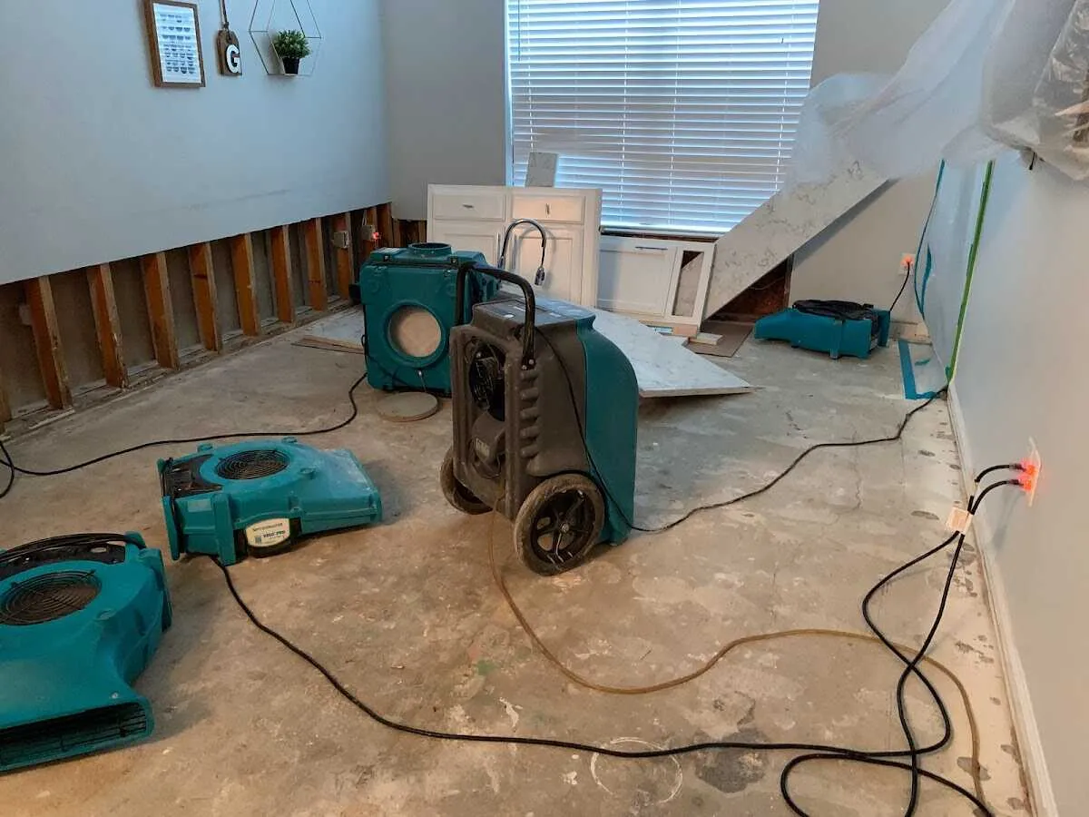 Dehumidifier in flood-cut room for Water Damage Restoration in Lauderhill